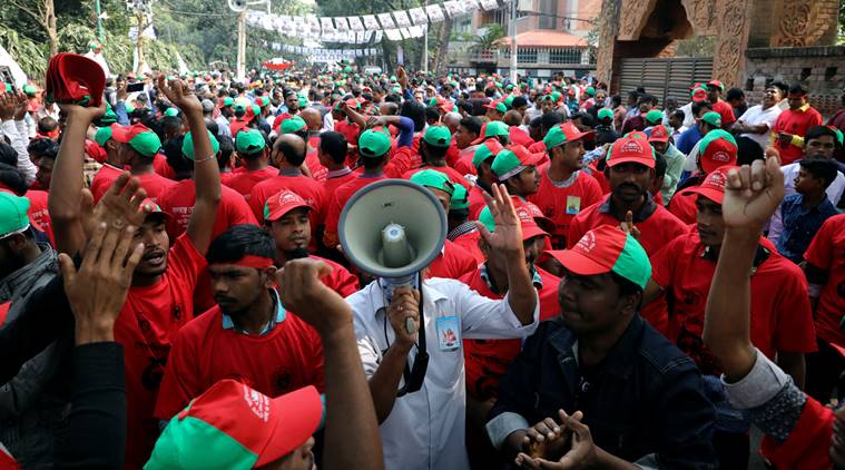 Supporters of the ruling party Bangladesh Awami League join in a campaign ahead of the 11th general election in Dhaka